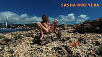 Outdor Beautiful teen Russian nudist girl Sasha publicly pisses in Mallorca Balearic Islands